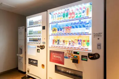 a refrigerator filled with drinks in a room at Miyako City Tokyo Takanawa in Tokyo
