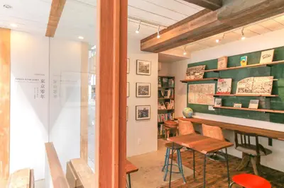 a room with a table and chairs and a desk at TOKYO LITTLE HOUSE in Tokyo