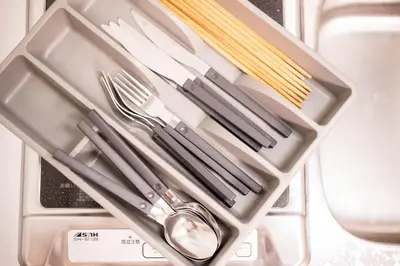 a plastic tray with utensils in a refrigerator at Maison de Takinogawa in Tokyo