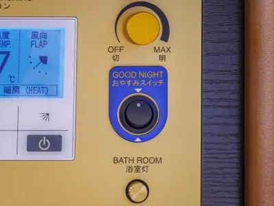 a remote control with the words good night and earth room at APA Hotel Kanda Ekihigashi in Tokyo