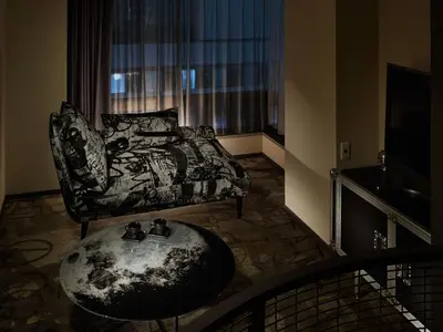 a living room with a couch and a table at Akasaka Granbell Hotel in Tokyo
