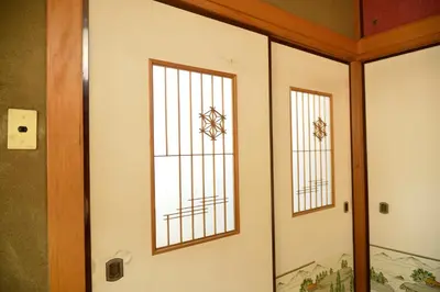 a door with two windows in a room at Yahiro Skytree House in Tokyo