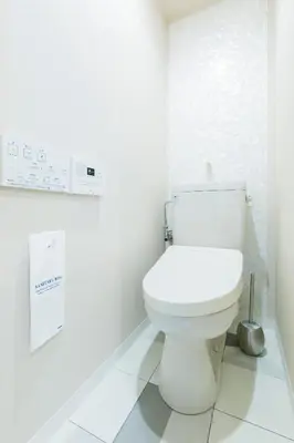 a bathroom with a white toilet in a room at KAGO 34 Tokyo by Shukuba HOTEL in Tokyo
