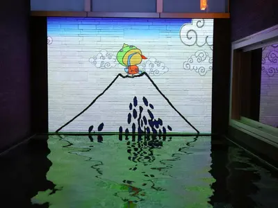a painting on the side of a wall with water at Dormy Inn Premium Shibuya-jingumae in Tokyo