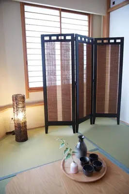 a room with a table with a plate of food at SHINJUKU 5-ROOM Family house in Tokyo