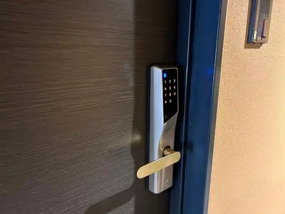 a close up of a door handle on a door at Cypressinn Tokyo in Tokyo