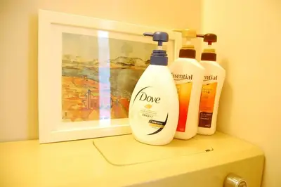 a couple of bottles of detergent sitting on top of a shelf at Urban Core Shikano 501 in Tokyo