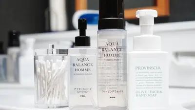 a group of bottles oficating products sitting on a counter at First Cabin Ichigaya in Tokyo