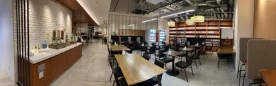 a dining room with tables and chairs in a restaurant at First Cabin Ichigaya in Tokyo