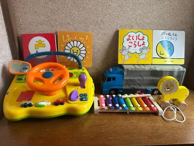 a childs toy with a toy car and stationery at Tokyo Kamakura House in Tokyo