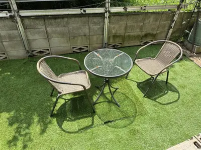 two chairs and a glass table and two chairs at Tokyo Kamakura House in Tokyo