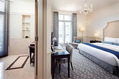 a hotel room with a bed and a desk at The Tokyo Station Hotel in Tokyo