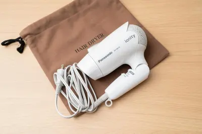 two white wii controllers in a bag on a table at Pearl Hotel Shinjuku Akebonobashi in Tokyo