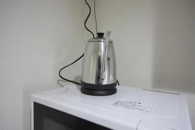 a blender sitting on top of a white table at Sorapia Tokyo in Tokyo