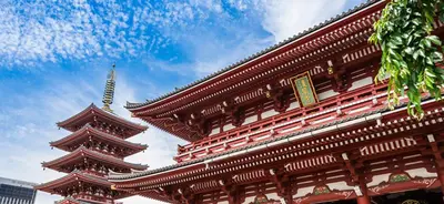 a building with a pagoda in front of a sky at Tokyo inn Sakura An in Tokyo