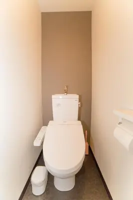 a bathroom with a white toilet in a room at Universal Haneda in Tokyo