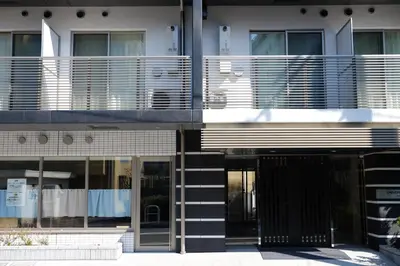an external view of a building with glass doors at Universal Haneda in Tokyo