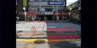 a picture of a crosswalk in a city at Shin Okubo Sekitei in Tokyo