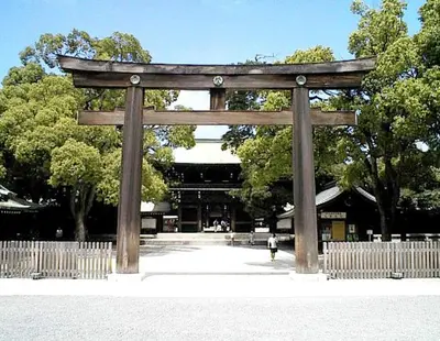 a torii gate in front of a building at Shibuya Stay Tokyo A202 in Tokyo