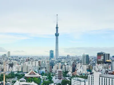 a view of a city with a tower in the background at Asakusa View Hotel in Tokyo