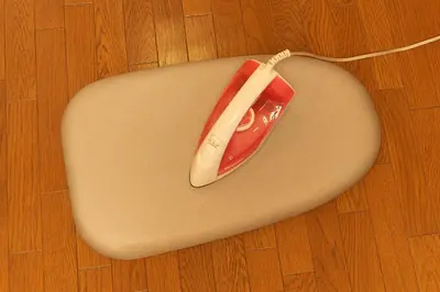 a computer mouse sitting on top of a wooden floor at Garden Otsuka in Tokyo