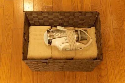 a brown basket with a music instrument in it at Garden Otsuka in Tokyo