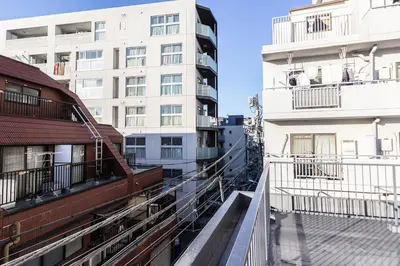 a view from the balcony of a building at Ikebukuro Yamase Building #GR1 in Tokyo