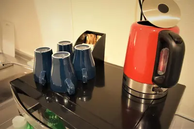 a coffee maker sitting on top of a counter at Residence Condominium KALAHAAI in Tokyo