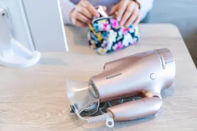a hair dryer sitting on top of a table at Super Hotel Tokyo Hamamatsucho in Tokyo