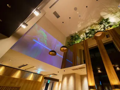 a large window in the ceiling of a building at Super Hotel Tokyo Hamamatsucho in Tokyo
