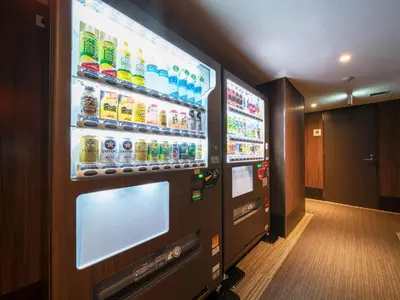 a vending machine with soda and sodas at Super Hotel Tokyo Hamamatsucho in Tokyo