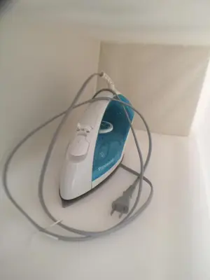 a computer mouse with a wire on top of it at COCO Nakameguro 201 in Tokyo