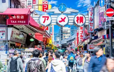 a crowd of people walking down a busy city street at Alo BnB 1 - Near UENO, AKIHABARA, SENSOJI, TOKYO SKY TREE - Self check-in in Tokyo