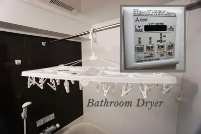 a bathroom with a white sink and a mirror at Asakusa Eight -Tokyo Condominium Hotel- in Tokyo