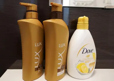 three bottles of laundry detergent sitting next to each other at Asakusa Eight -Tokyo Condominium Hotel- in Tokyo