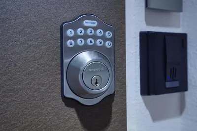 a remote control is attached to a wall at Asakusa Eight -Tokyo Condominium Hotel- in Tokyo
