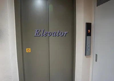 a elevator with the word elevator on the door at Asakusa Eight -Tokyo Condominium Hotel- in Tokyo