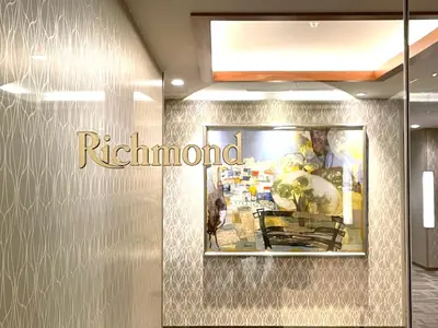 a sign on the wall of a store at Richmond Hotel Tokyo Mejiro in Tokyo