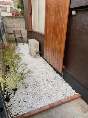 a microwave sitting on the side of a house at Alo BnB 2 - Near NIPPORI, YANAKA GINZA, UENO, SENSOJI - Self check-in in Tokyo