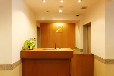 a bathroom with a sink and a mirror at Chisun Inn Keikyu Kamata in Tokyo
