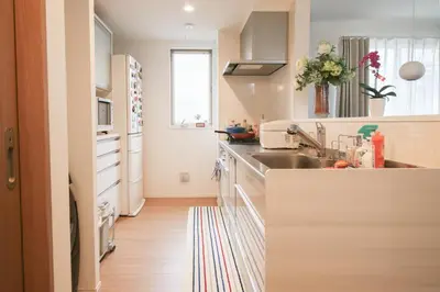 a kitchen with a sink and a counter top at Uhome Ikebukuro Villa 2 in Tokyo