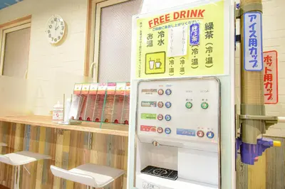 a free drink machine in a fast food restaurant at Kamata Inn Social in Tokyo