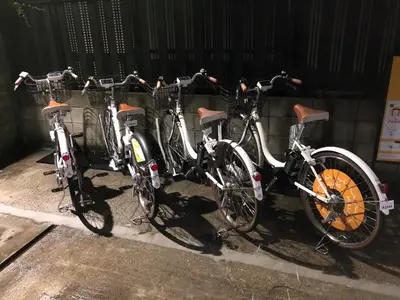 a group of three bikes parked next to each other at TOP EDGE HOSTEL Koenji in Tokyo