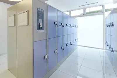a row of lockers in a large room at Shinagawa Prince Hotel N Tower in Tokyo