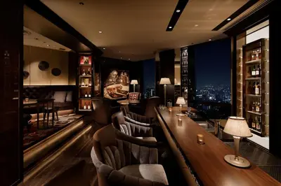 a bar at a restaurant with a view of the city at Shinagawa Prince Hotel N Tower in Tokyo