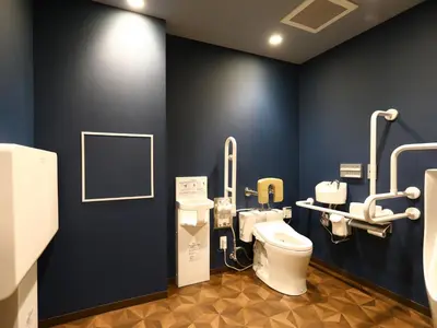 a bathroom with two toilets and a sink and a toilet at KOKO HOTEL Ikebukuro - formerly Hotel Wing International Select Ikebukuro in Tokyo