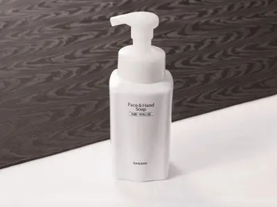 a white bottle of liquid soap sitting on a counter at APA Hotel Mita Ekimae in Tokyo