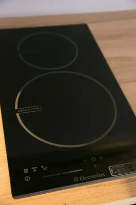 a black book with a picture of a disk at THE WARDROBE Hotel Shimokitazawa in Tokyo