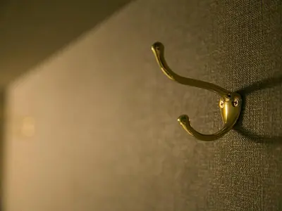 a close up of a door handle on a window at THE WARDROBE Hotel Shimokitazawa in Tokyo