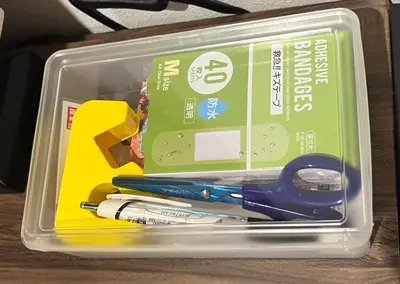 a plastic container with scissors and other office supplies at Roppongi WoodsHouse501 in Tokyo
